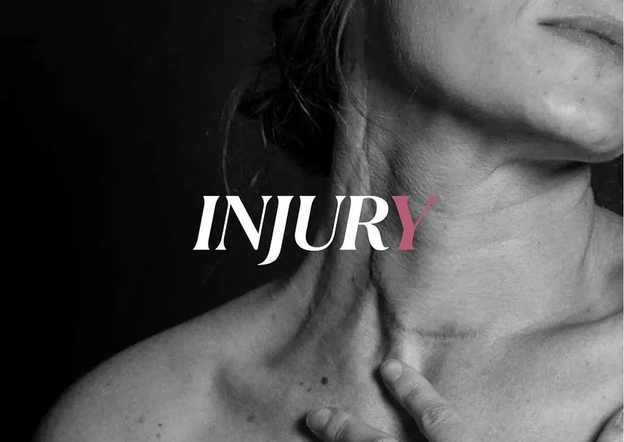 The word INJURY set across a close photograph of a woman’s throat and collarbone, her own hand at her neck