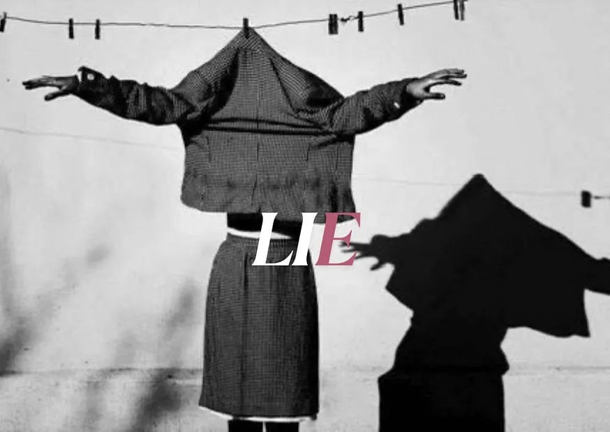 The word LIE set across a photograph of an empty coat and hood pegged out on a washing line, arms outstretched, casting a human shadow
